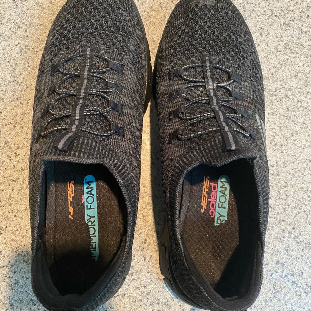 Sketchers Slip on memory foam tennis shoe.